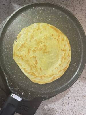 Ligne de production de Paratha entièrement automatique avec acier inoxydable de qualité alimentaire et vitesse de fonctionnement réglable